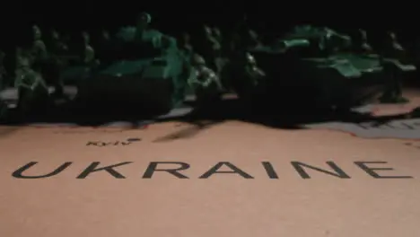 Tracking Shot of Toy Soldiers On Map of Ukraine 05