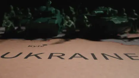 Tracking Shot of Toy Soldiers On Map of Ukraine 04