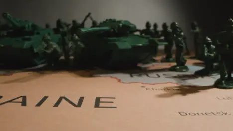 Tracking Shot of Toy Soldiers On Map of Ukraine 08