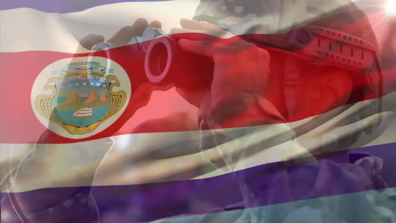 Animation of flag of costa rica over caucasian male soldier with binoculars