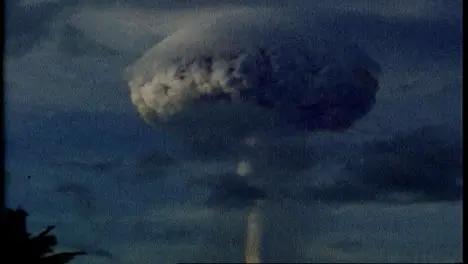 Archive Clip of Nuclear Bomb Explosion in Tropical Setting