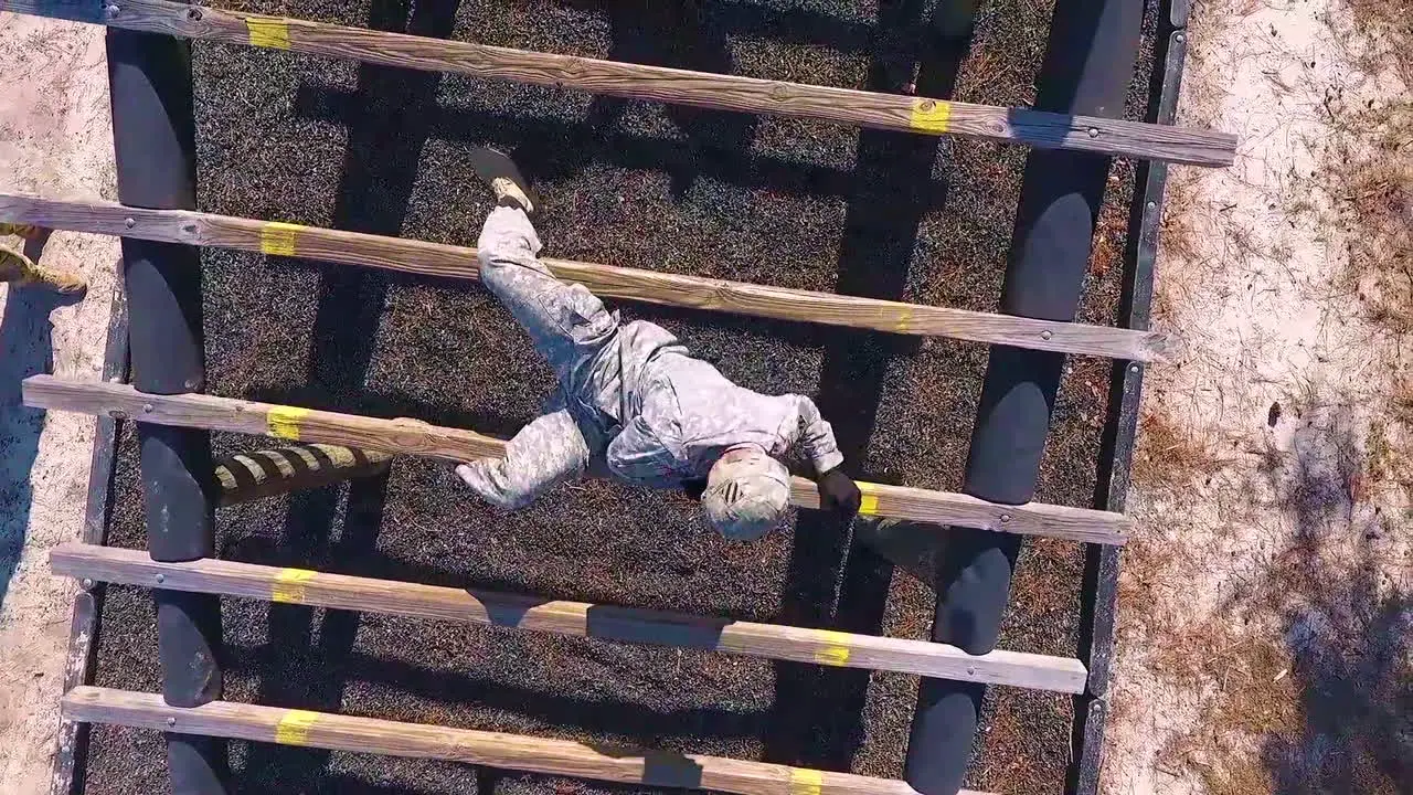 An Aerial Over Us Army Soldiers Going Through Obstacle Course Exercises In Basic Training 2