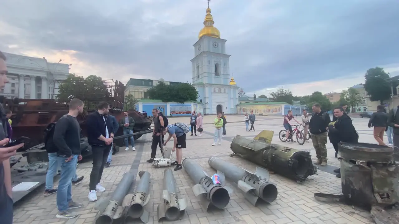 Ukrainians Admire Russian Bombs And Other War Wreckage Sitting In A Square In Downtown Kyiv Kiev Ukraine