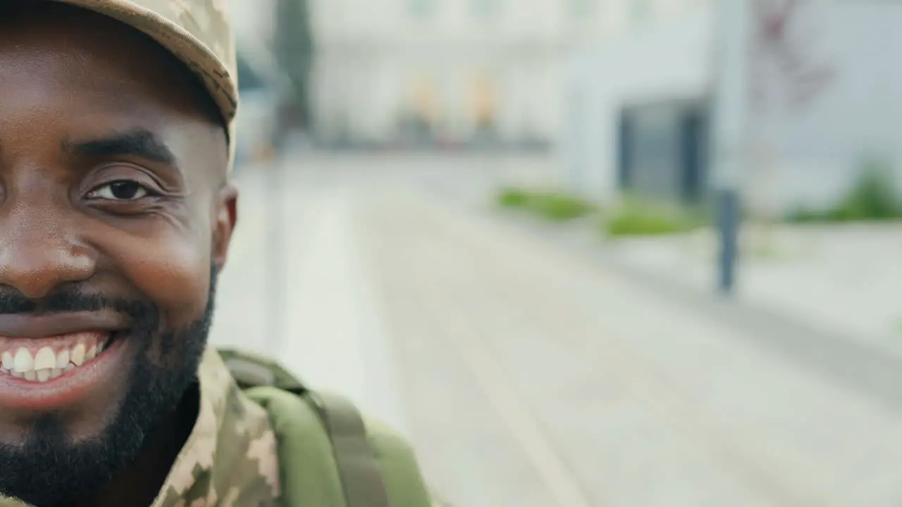 Portrait Of A Cheerful Soldier Smiling In The Street