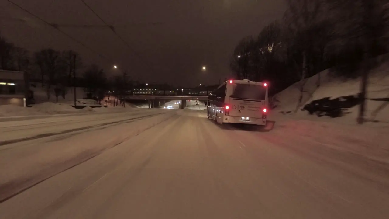 POV shot driving along a small street and then stopping at lights in Helsinki