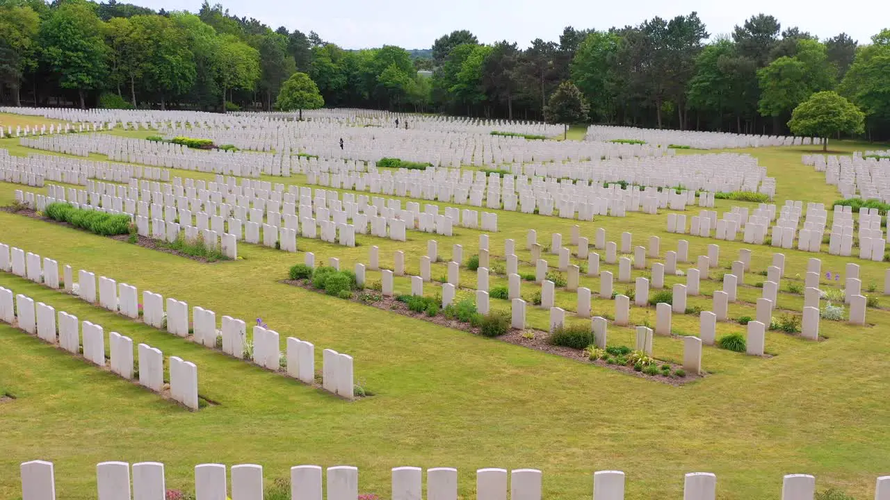 Aerial over headstones of the Etaples France World War cemetery military graveyard and headstones of soldiers 1