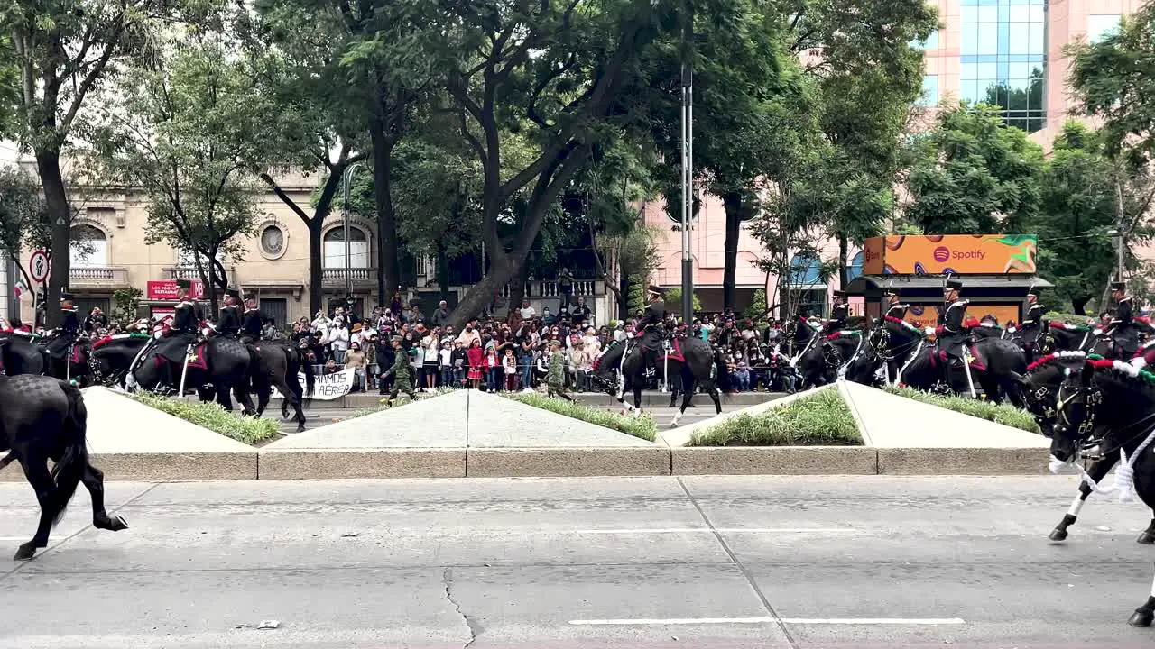 slow motion shot of the cavalry platoon of the mexican army during the military parade