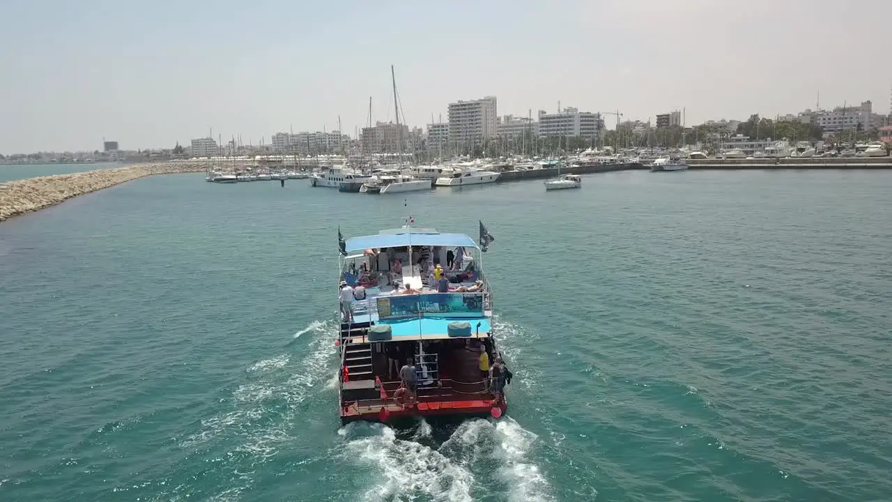 Areal Close Shot Of Tourist Boat Returning Back To Park In Larnaca Old Marina Cyprus