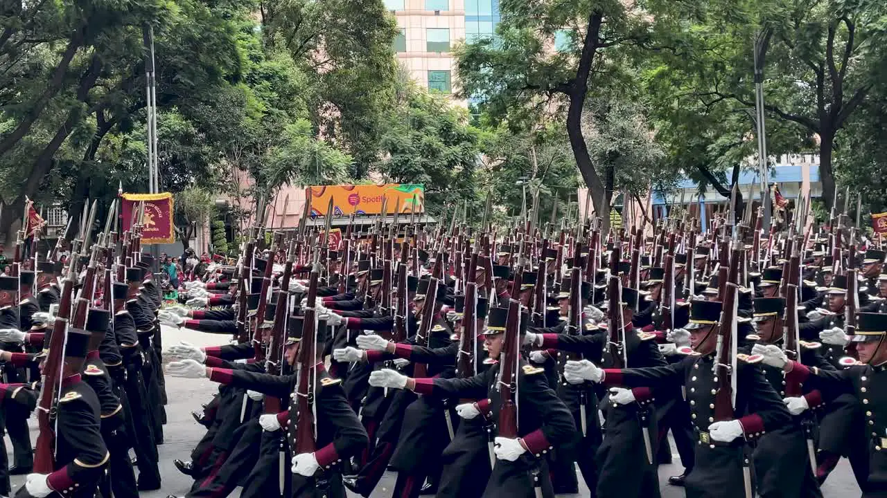 slow motion shot of the mexican army war corps during the military parade