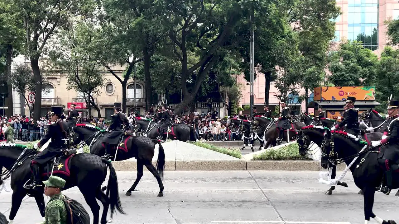 slow motion shot of the Mexican army platoon on horseback during the military parade