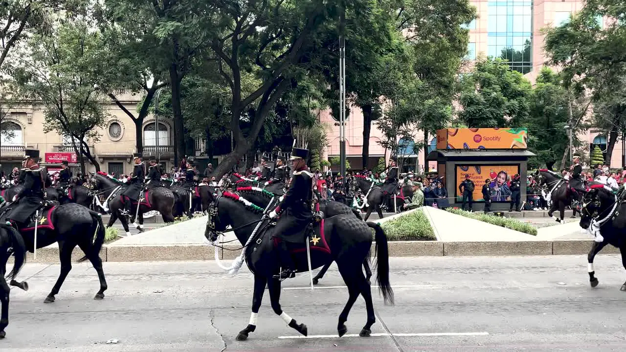 slow motion shot of the mexican army cavalry corps during the independence day parade