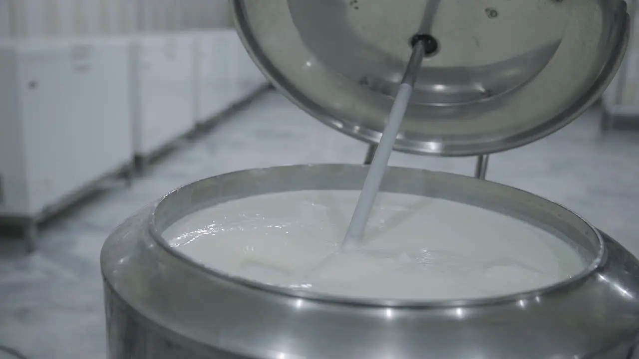 Milk processing in a machine Close up view