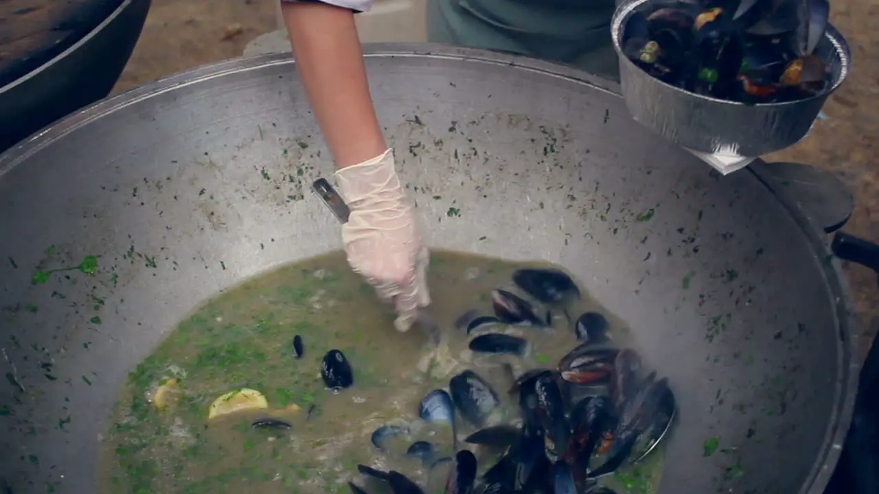 Seafood soup with mussels Mussel soup in bowl Cooking seafood in pan