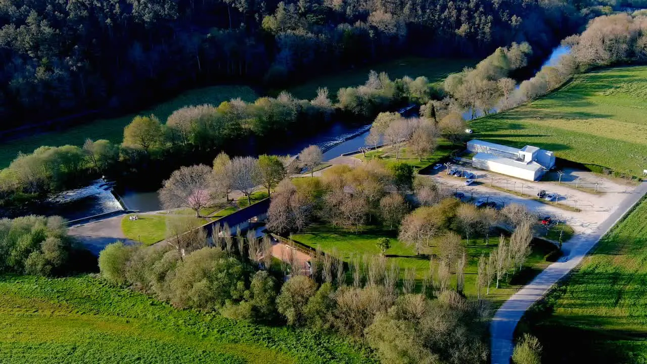 Aerial View Flying Over Praia fluvial de Tapia Park