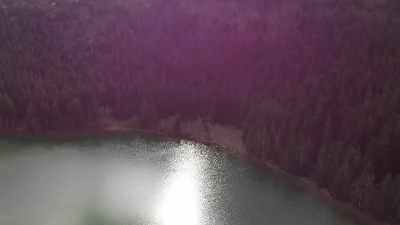 Aerial view of Sfanta Ana Lake in Romania volcanic lake with beautiful green water