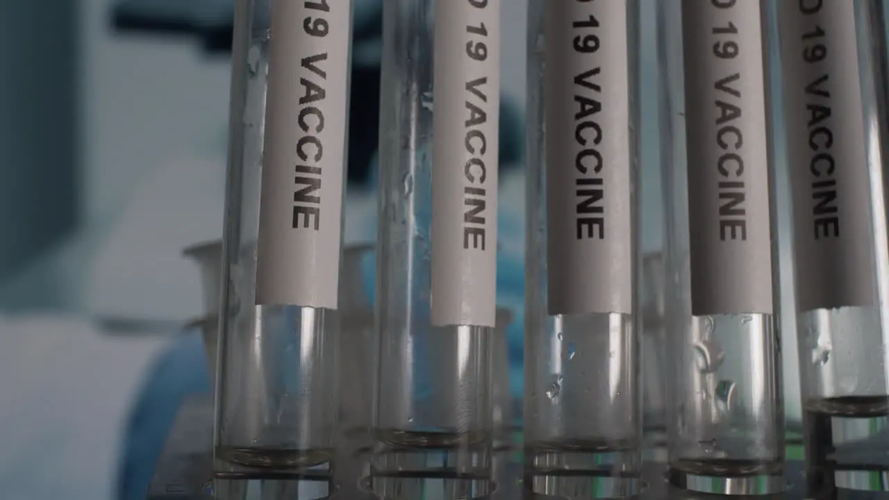 Sputnik V Covid Vaccine Test Tube Vials In Laboratory Rack