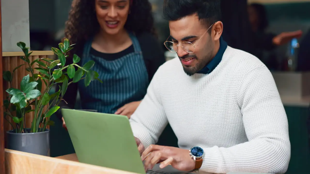 Laptop waitress or coffee shop customer