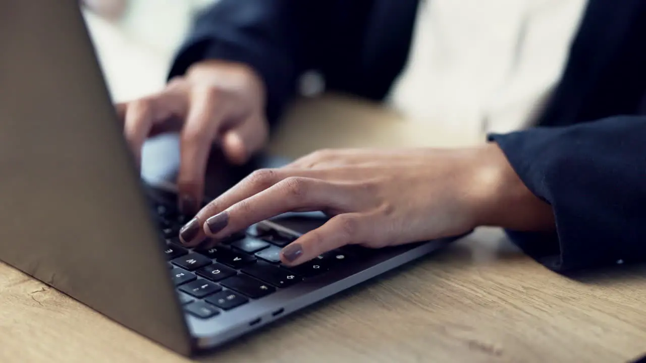 Hands person and typing closeup on laptop