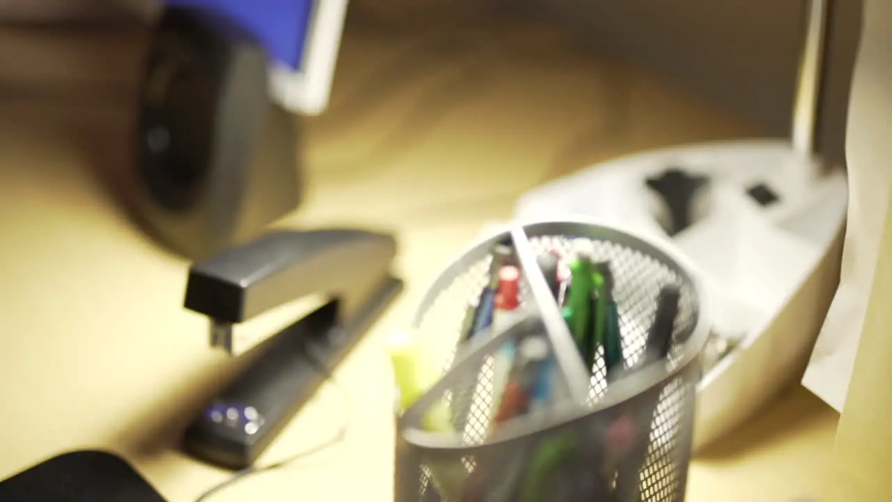 Close Up of Desk with Manilla File Folders and Stapler