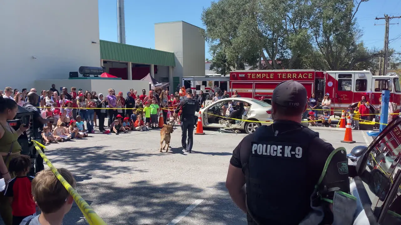 Static shot of on-site vehicle extrication demonstration to kids at Annual Open House event organized by Temple Terrace Fire Department