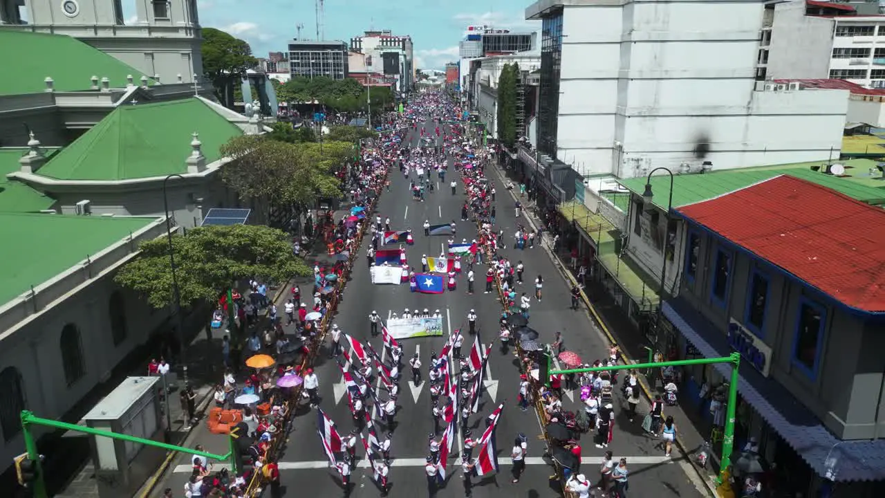 Drone Shot Over Flag Bearers and Marching Bands During Costa Rican Independence Day Parade