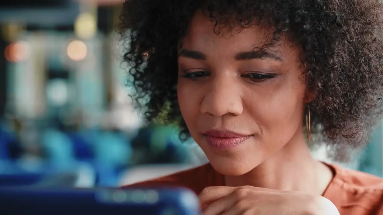 Close up of beautiful African woman using a tablet