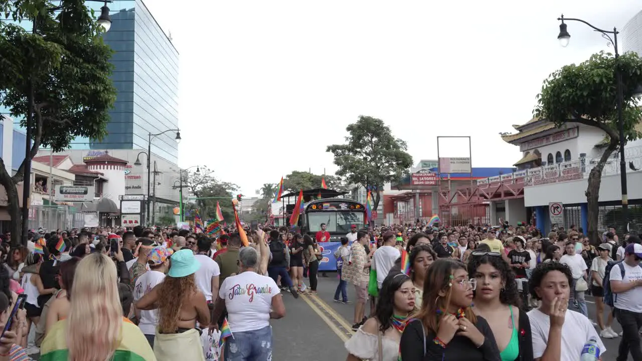 People Walking Down Street During Pride Parade