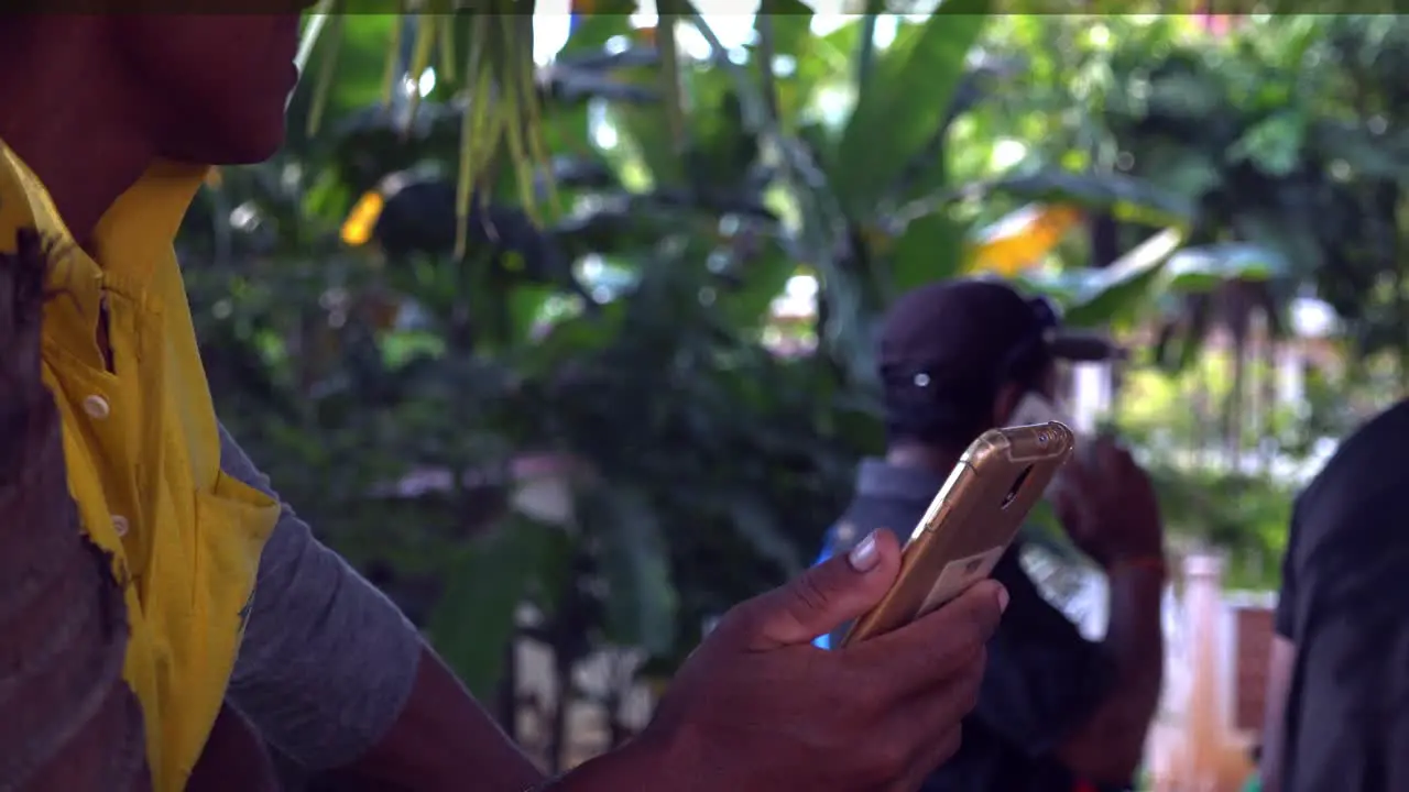 Khmer Guy Looking at his Golden Phone