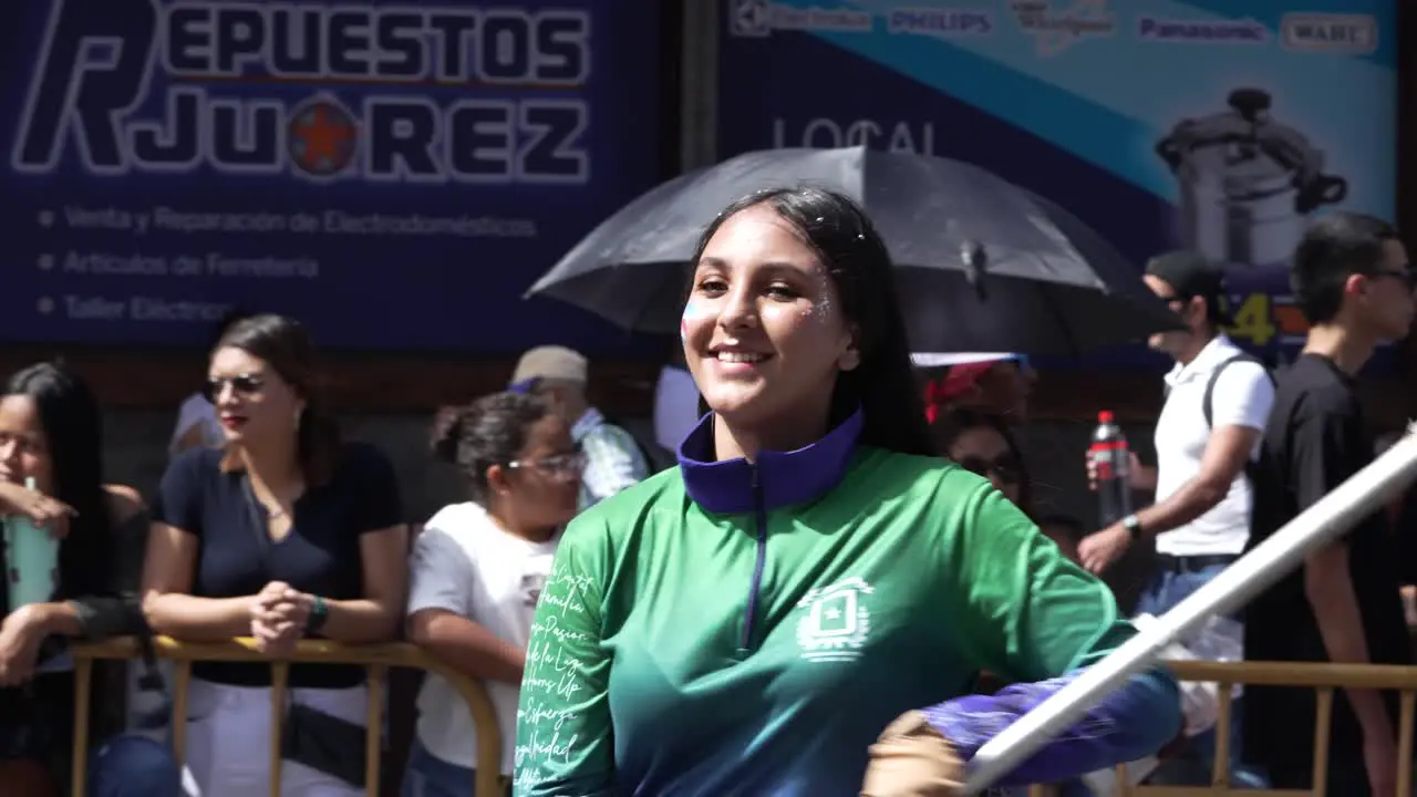 Student Performing Flag Choreography During Costa Rican Independence Day Parade in San Jose