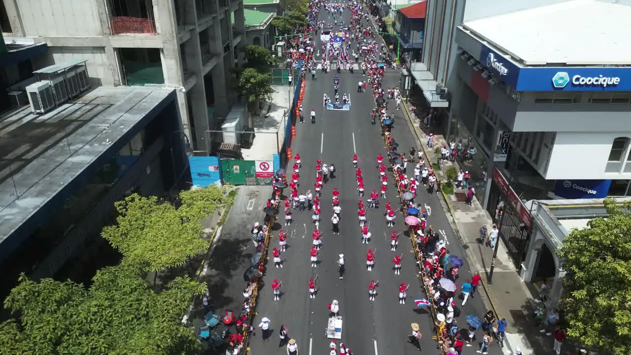 Drone Shot Flying Over Marching Bands During Costa Rican Independence Day Parade in San Jose Capitol