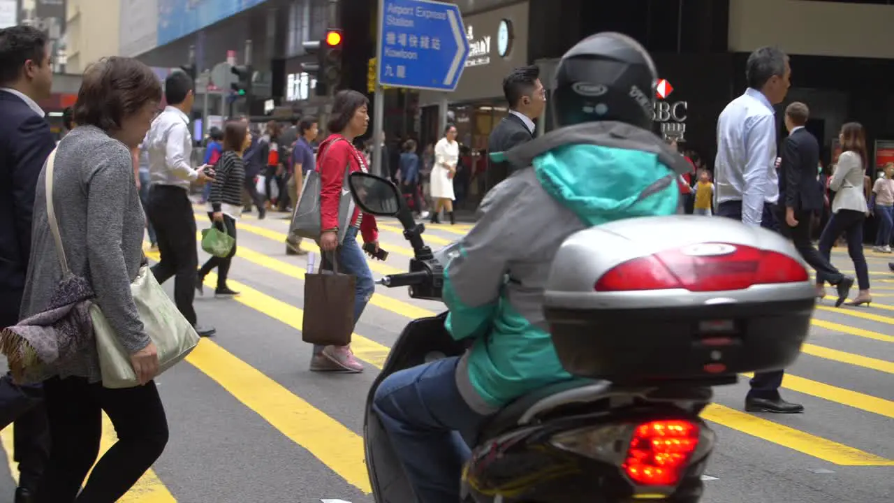 People Crossing Road in Hong Kong CBD