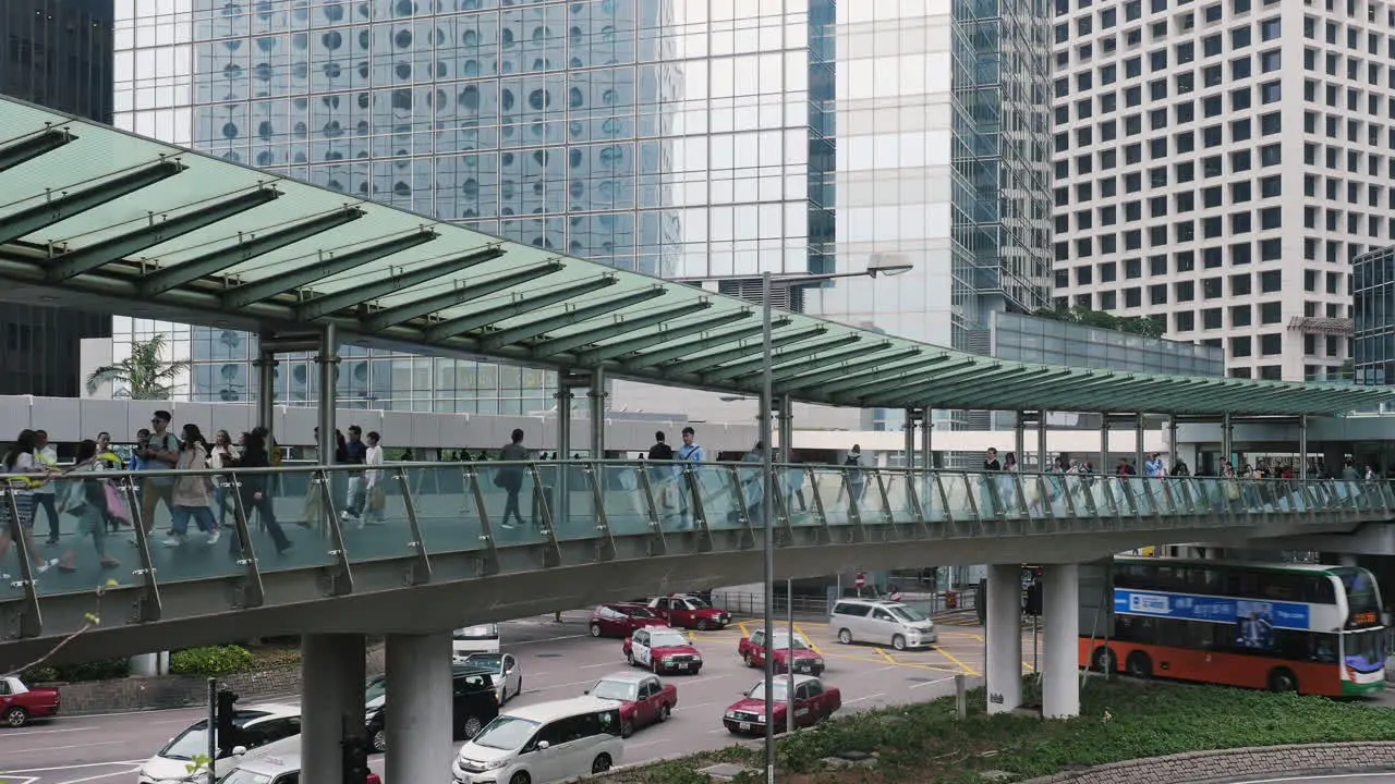 Overhead walkwaytaking pedestrians over the busy Connaught Road Central