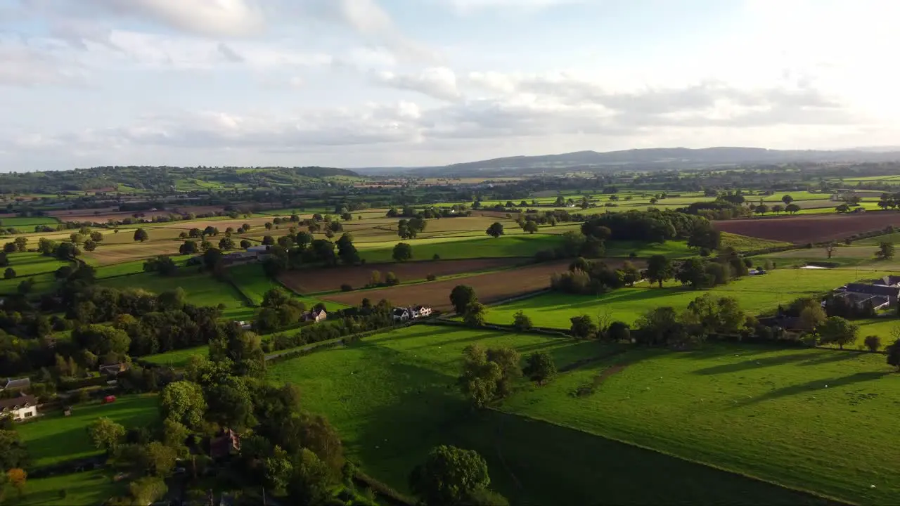 Drone shot green fields and nature in Shropshire countryside England