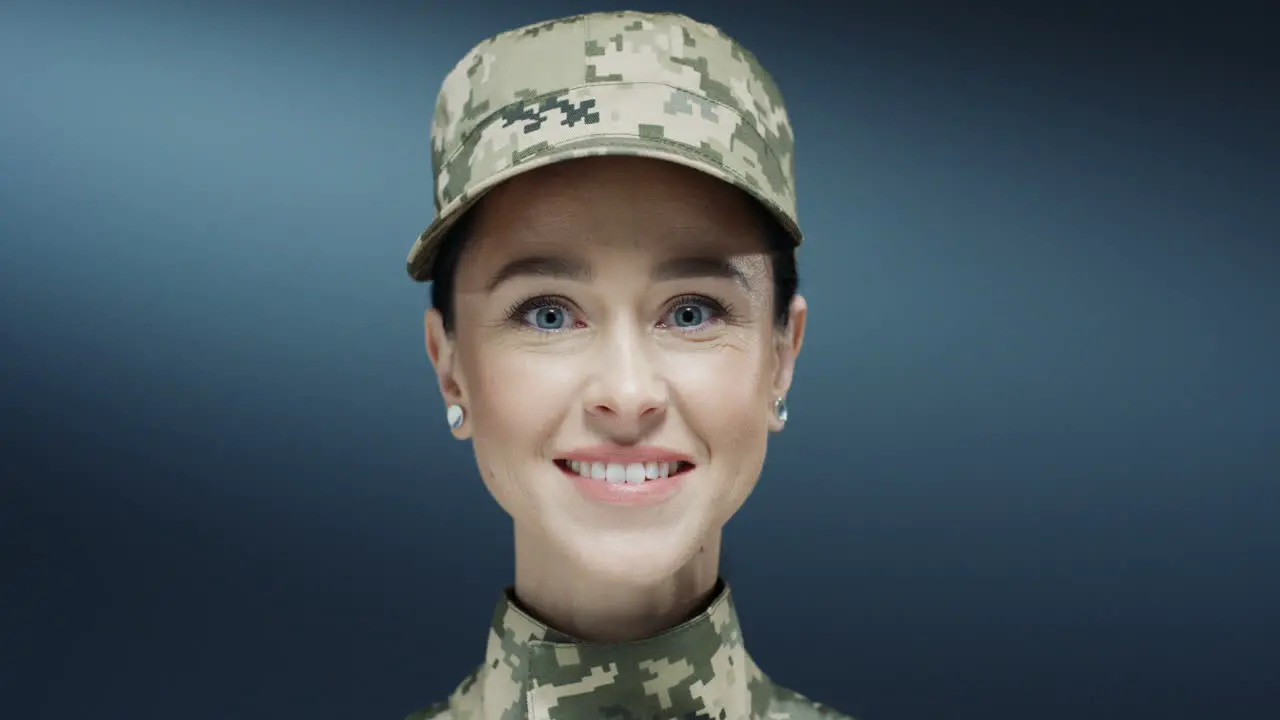 Portrait Shot Of The Young Attractive Brunette Woman From Us Army In The Uniform And Hat Smiling Joyfully