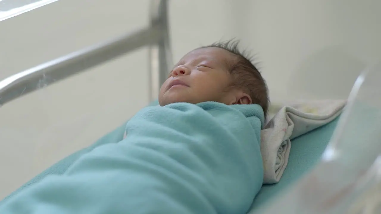 Sweet Dreams Newborn Baby Sleeping in Incubator