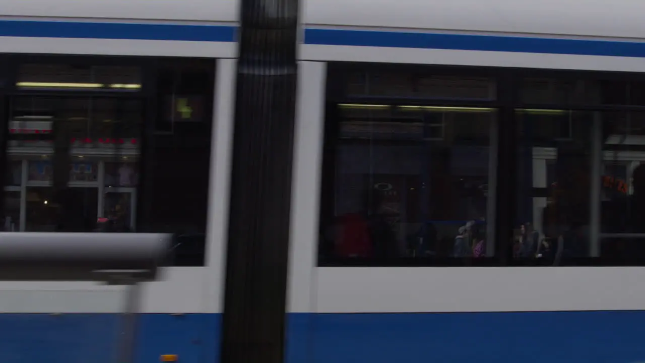 Amsterdam Driving by Filming out of the Window as Europeans and Residents on Bikes Ride by 4K Slow Motion RED Camera