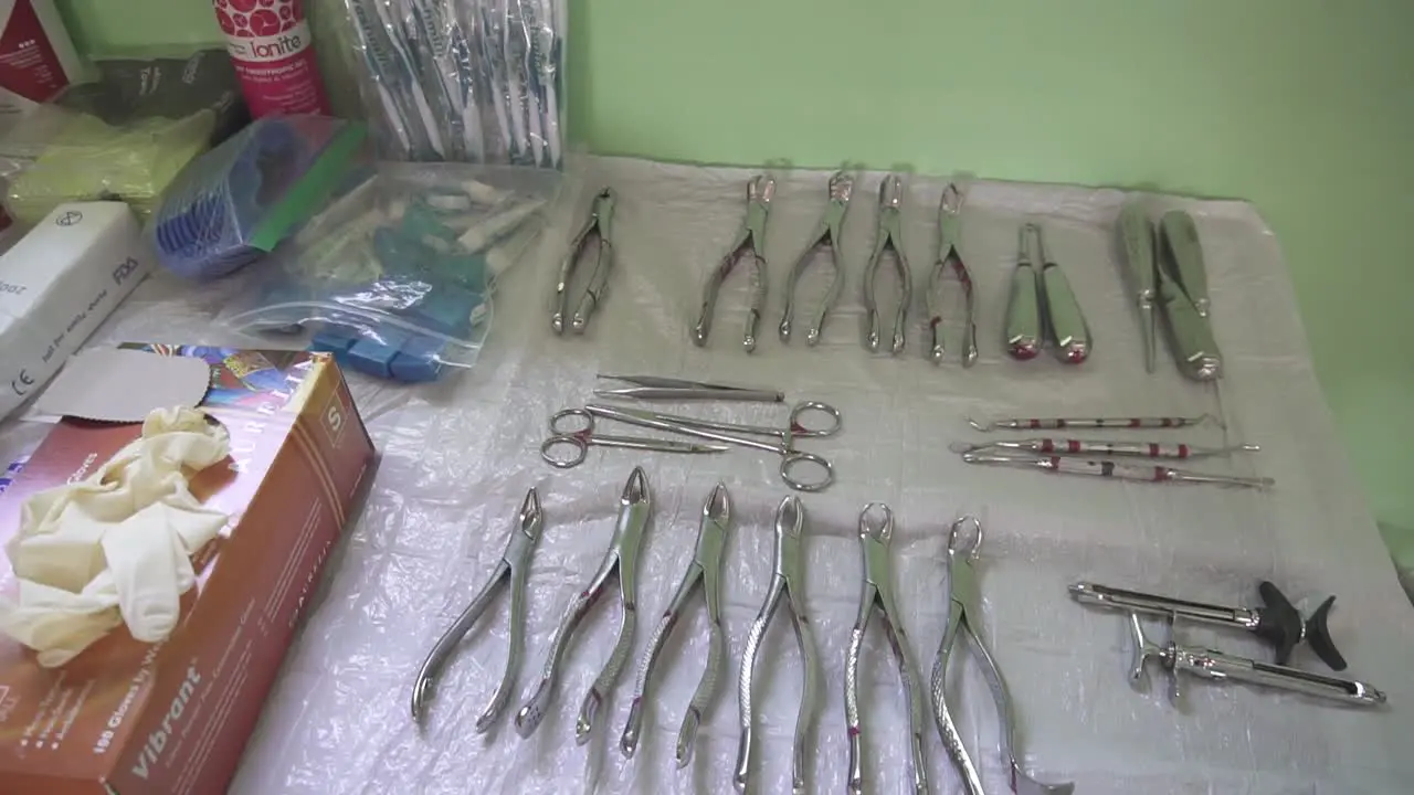 Dental medical instruments on a table prepared for a medical brigade in a poor community