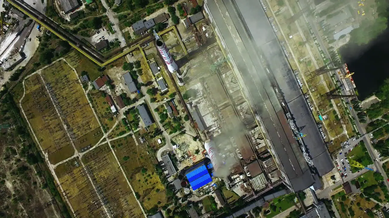 Industrial factory complex with smokestacks at sunny day Aerial drone view