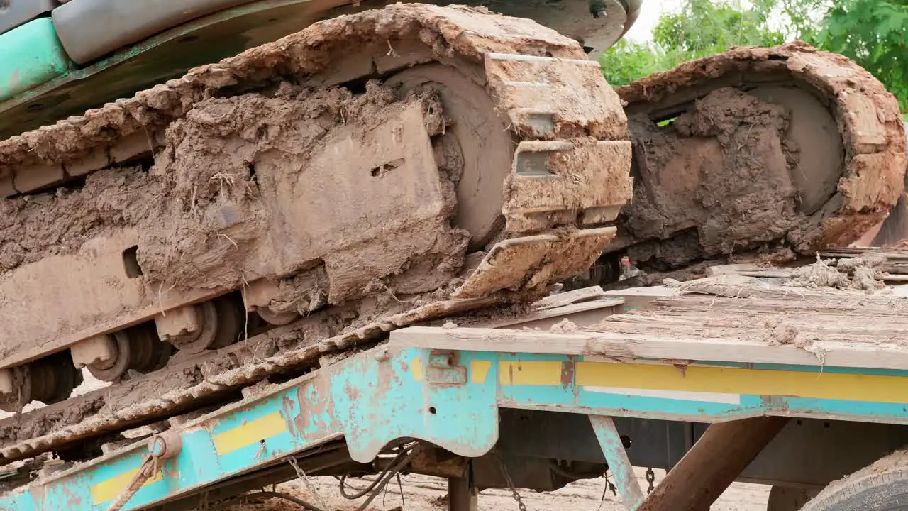 Backhoe crawler detail moving to be transported