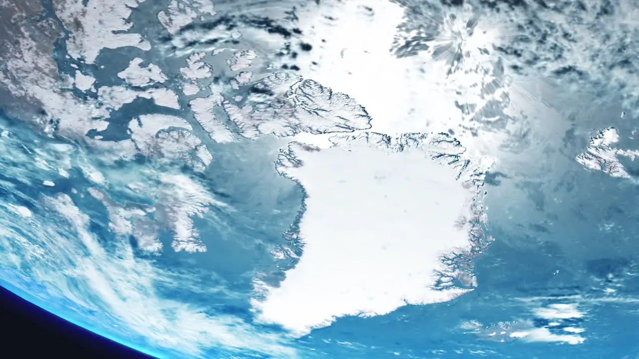 Greenland Arctic from Space with Shrinking Ice Shelf Due to Climate Change with Earth Slowly Rotating with View from Orbit Dynamic Clouds Sea and Atmosphere