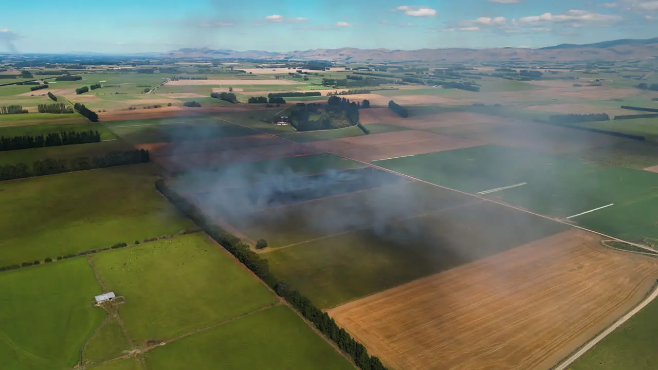 Preparing land for plantation by controlled fire on farmland by Gore New Zealand