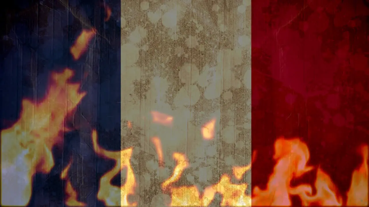 French flag being burned down by fire