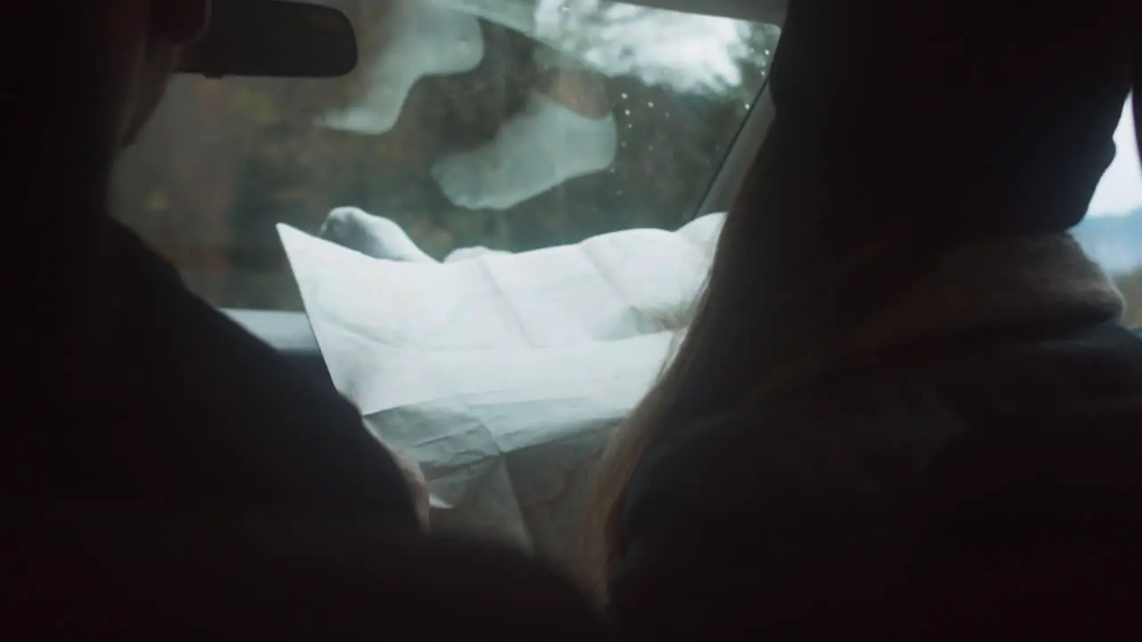 Woman Reading Map in Car 01