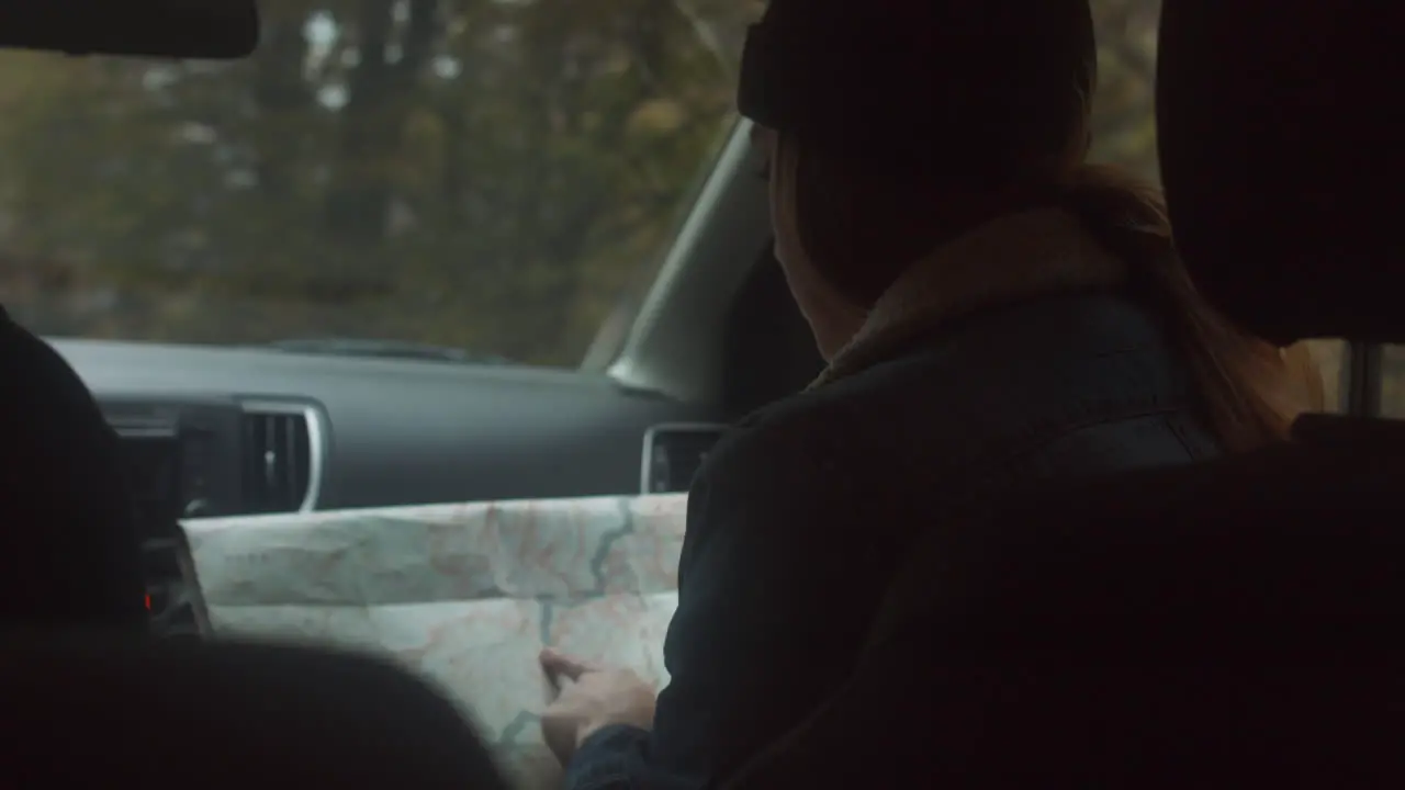 Woman Reading Map in Car 04