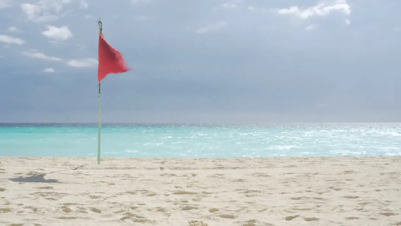 Red Flag on the Beach in Cancun