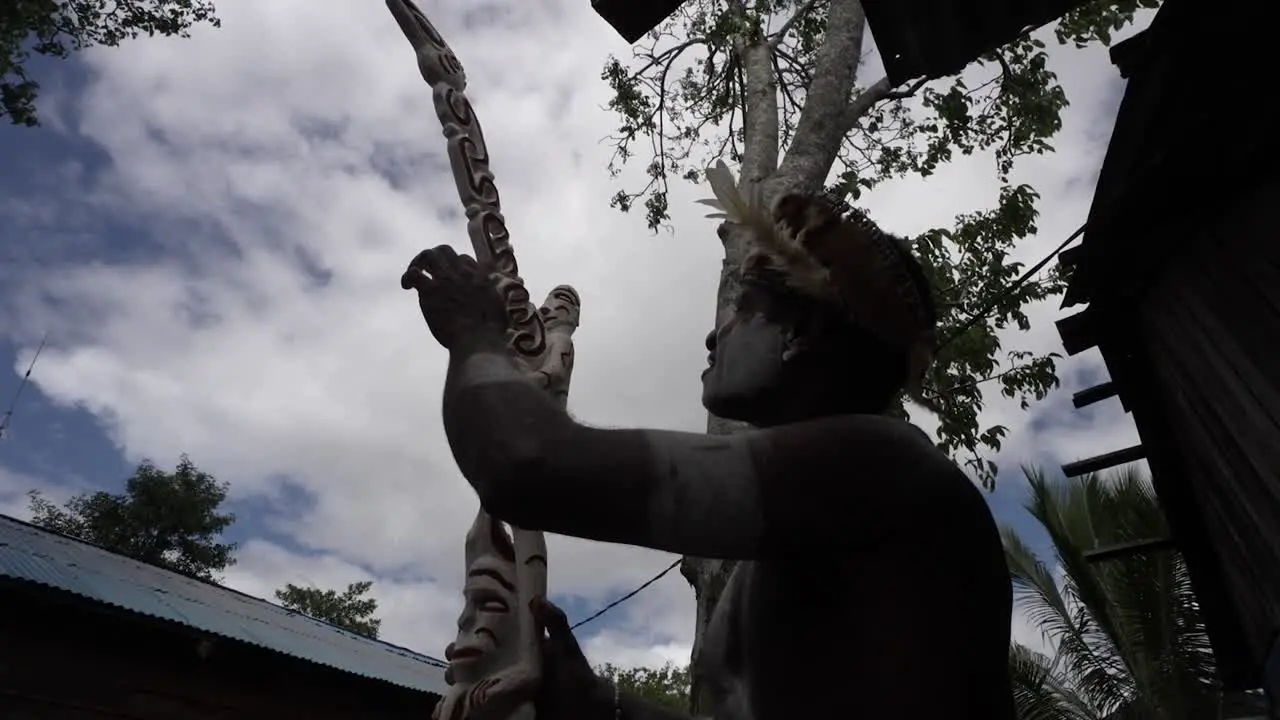 The photo shows the patterns and motifs of the Asmat Tribe carvings in an abstract style