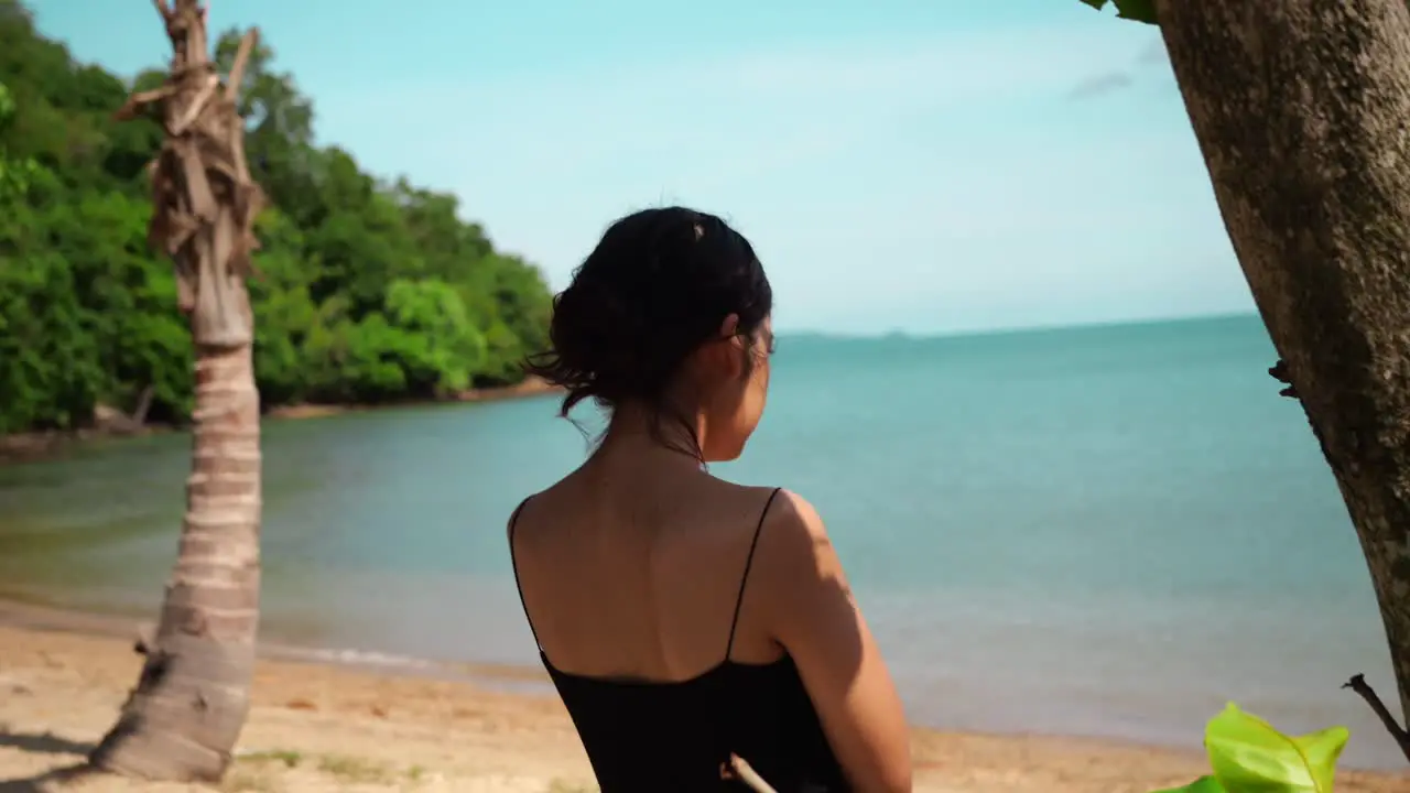 Woman at the Sunrise Beach in Phuket Thailand