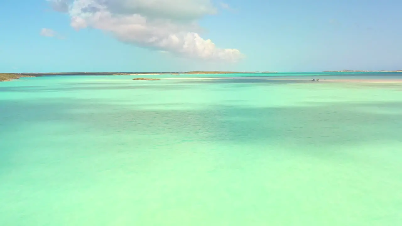 Drone over sand bar and ocean in Exuma Bahamas 4K UHD