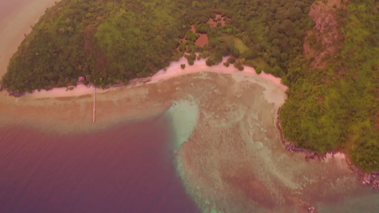 Colorful sunset from a drone over tropical islands in the Philippines at golden hour-1