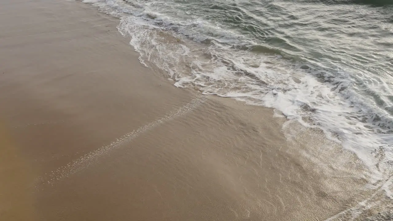 Soft sea waves on the portugese shore in the coast of Portugal